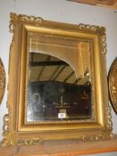 A late Victorian gilt framed bevel edged mirror. COLLECT ONLY.