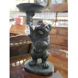 A large carved wood Black Forest bear plant stand, 53cm., COLLECT ONLY.