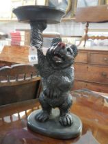 A large carved wood Black Forest bear plant stand, 53cm., COLLECT ONLY.
