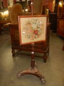 A 19th century mahogany pole screen, COLLECT ONLY.