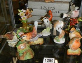 A mixed lot of porcelain bird figures.