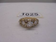 A 14ct yellow gold twelve stone ring, size P, 4.3 grams.