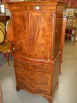 A mid 20th century drinks cabinet with imitation drawer front to base. COLLECT ONLY.