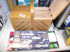 A sewing box, 200 new embroidery threads and a sewing kit