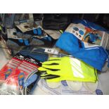 A quantity of new running items including socks, gloves, ultra light running jacket size XL etc