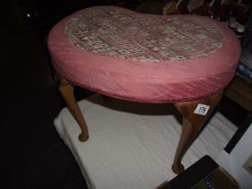 An Edwardian kidney shaped dressing table stool on Queen Anne legs COLLECT ONLY
