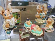 Five Pendelfin figures, a Peter Rabbit and a Bad Taste Bear.