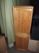 A pair of Ikea pine cabinets (1 missing handle)