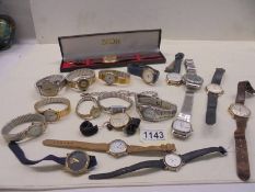 Approximately twenty assorted wrist watches.