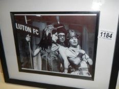 A framed and glazed signed photograph featuring Glenda Jackson.