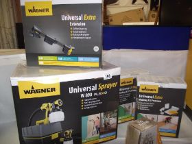 A Wagner new in boxes paint spraying system, handle extension and 2 masking kits COLLECT ONLT