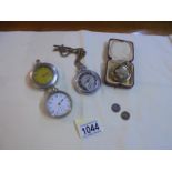 Three old pocket watches a/f, one on brass chain and a dried flower in case.