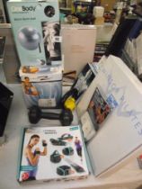 A quantity of new fitness items including fitness weights, facial sauna, gymballs etc