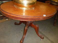 An early 20th century oval mahogany tip-top table, COLLECT ONLY.
