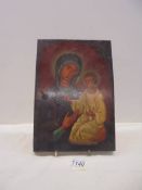 A religious painting of Madonna and child on wood.