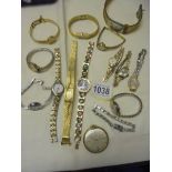 A mixed lot of ladies wristwatches including Gucci, Cocktail watches etc.,