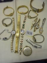 A mixed lot of ladies wristwatches including Gucci, Cocktail watches etc.,