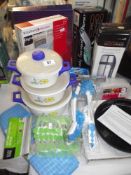 A quantity of new kitchen items including vacuum flask etc