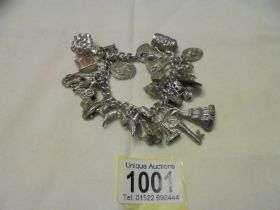 A four ounce silver charm bracelet.