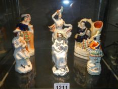 Six 19th century Staffordshire 'Scottish figures' (one has a chip to hat).