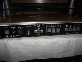 A Garrard record deck (lid a/f), Amstrad double decker VHS player, teleton stereo amplifier SAQ