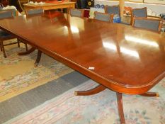 A mahogany double pedestal extending dining/conference table, extends to ten feet, COLLECT ONLY.