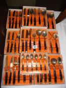 8 boxed sets of bronze age cutlery sets by Danasco, plus set of 6 teaspoons and box with 2 teaspoons