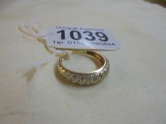 A yellow gold multi stone ring, size L, 2.1 grams.