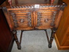 An oak two door hall cabinet, COLLECT ONLY.