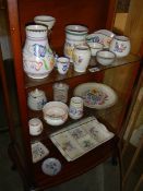 Three shelves of Poole pottery. COLLECT ONLY.