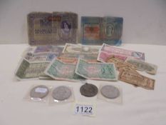 A Quantity of old bank notes including German and four old crowns.