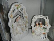 Two 19th century Staffordshire courting couple figures.