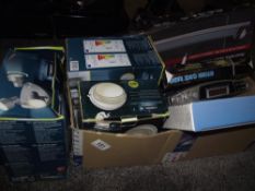 A quantity of new boxed lights, weather station, glass shelf and clock
