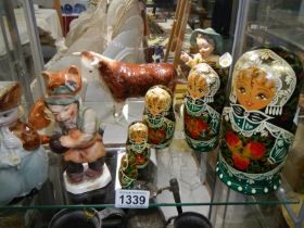 A set of 5 Russian graduated dolls, a Winstanley cat and other figures.