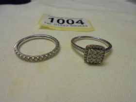 Two 9ct white gold and diamond rings, sizes N half and O, 5.3 grams.