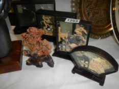 A collection of cased cork collages and a soapstone carving, COLLECT ONLY.