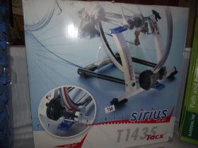 A cycle force Sirius T1435 cycle trainer, new in box