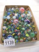 In excess of 250 vintage marbles.