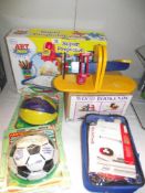 A boxed Art Attack super projector, Pro-shot football and basketball, bookends and a table tennis