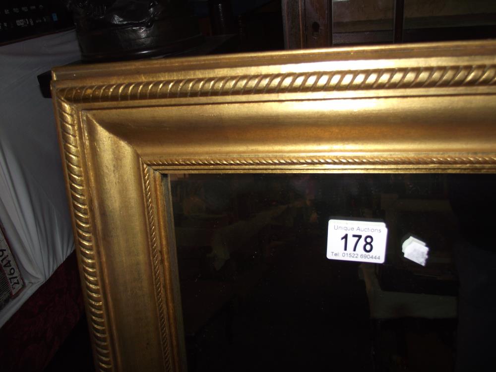 A large gilt framed mirror approx 80cm by 110cm COLLECT ONLY - Image 2 of 2