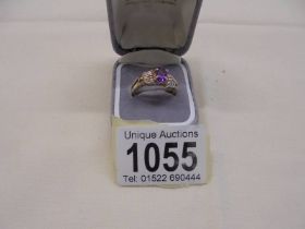 An amethyst/diamond set ring in 9ct gold , size N, 2.9 grams.