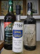 A bottle of 1998 vintage port, a bottle of whisky and a bottle of Stones original ginger wine.