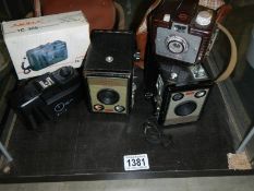 Two vintage Kodak Brownie cameras etc.,