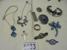 A mixed lot of vintage silver jewellery including dragonfly brooch, other brooches, bangle,