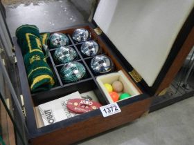A cased French Boules set.