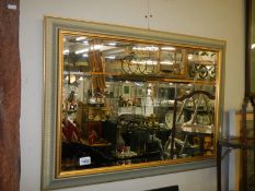 A good framed bevel edged mirror in good condition, COLLECT ONLY.