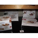 Boxed plates, cake stand and bowls by Ernesto