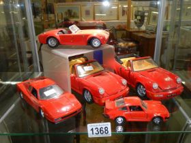 Two Porsche 911, A Revell AC Cobra, Polistil Ferrari and Matchbox die cast models.