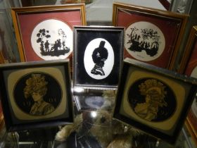 Three framed and glazed silhouettes and two other pictures.