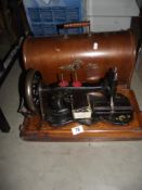 A cased Singer sewing machine COLLECT ONLY